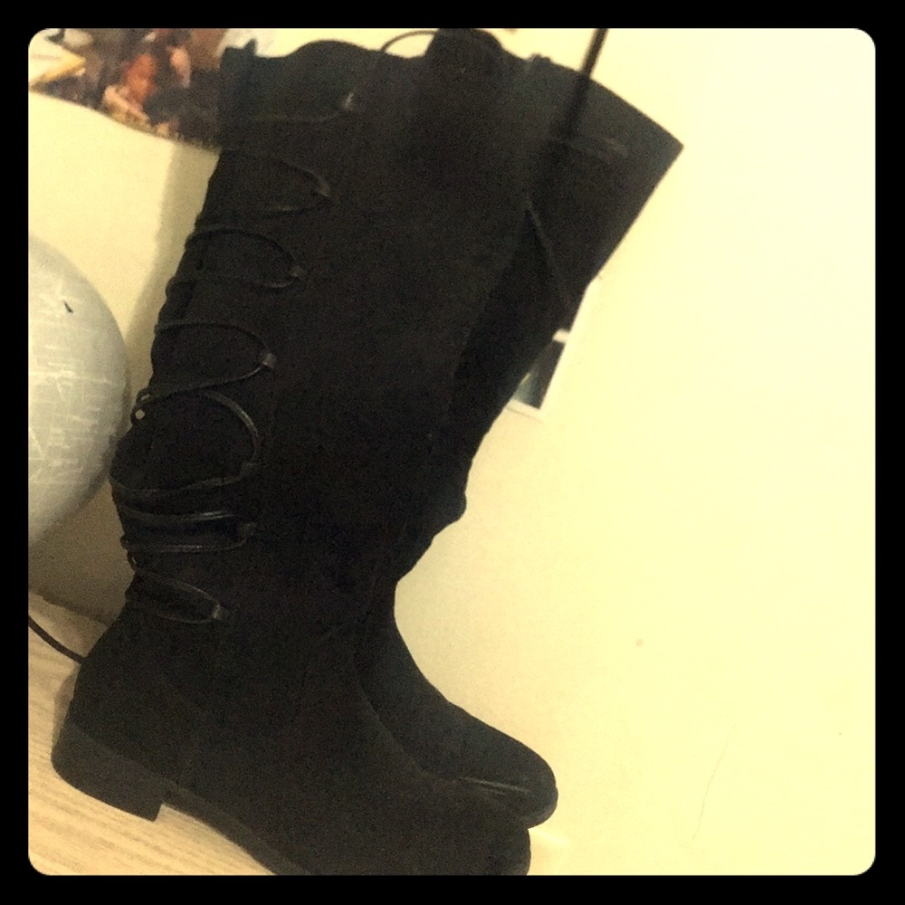 Black laced up knee high boots